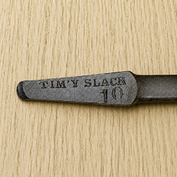 early Tim'y Slack tang stamp