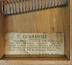 label for early Strickland Alexander Slack bit box